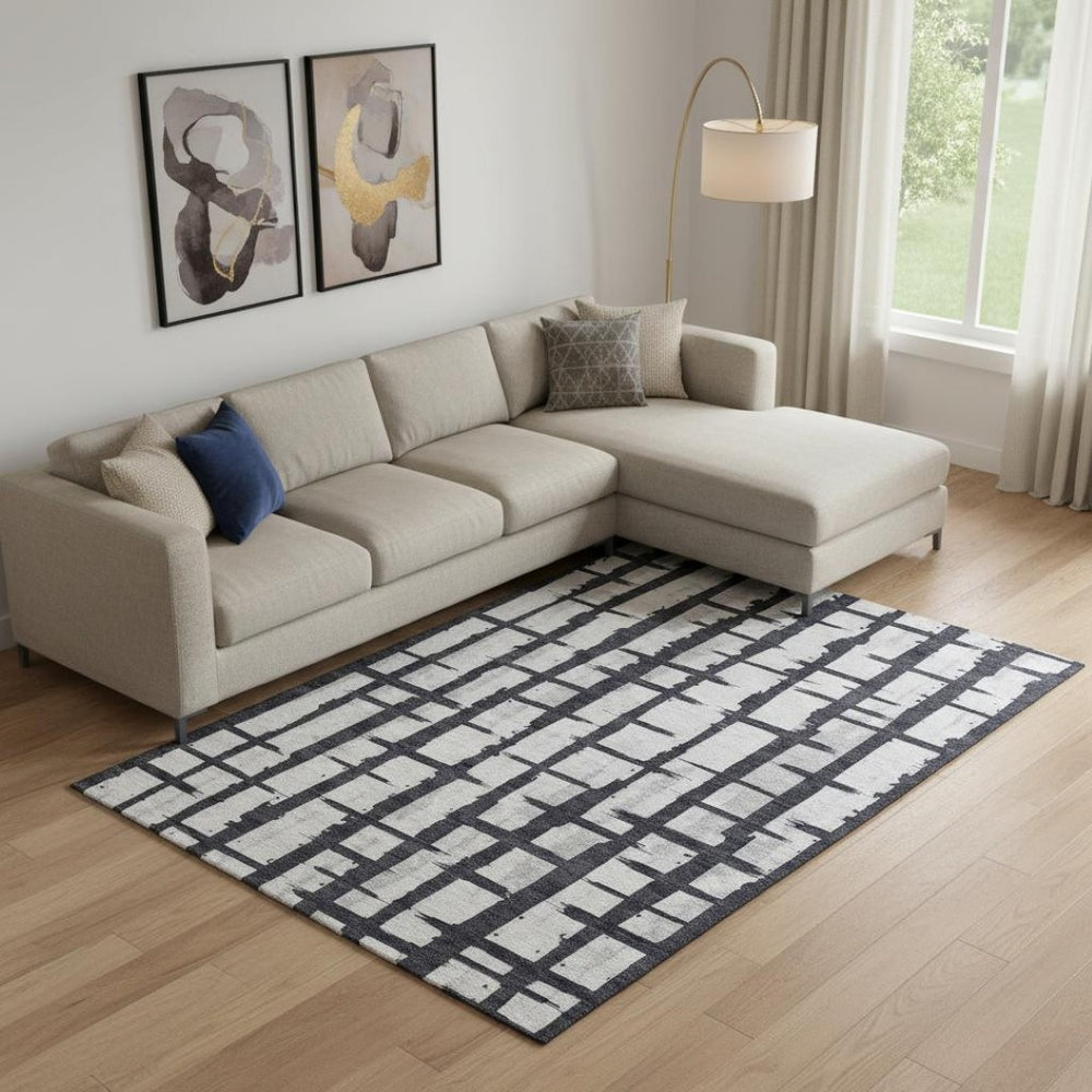 HomeRoots 8' X 10' Stylish Black and Silver Striped Washable Area Rug with UV Protection for Modern Homes 669346
