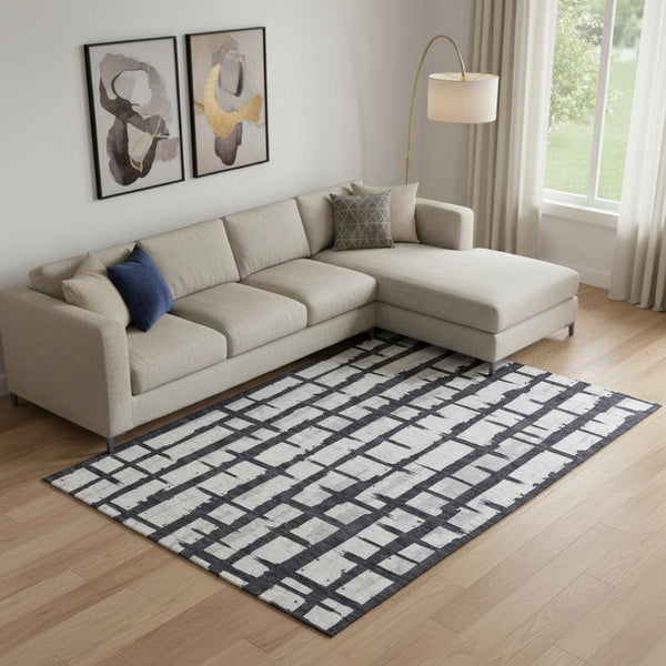 HomeRoots 8' X 10' Stylish Black and Silver Striped Washable Area Rug with UV Protection for Modern Homes 669346