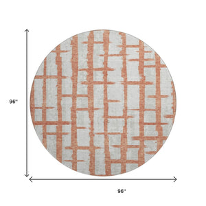 HomeRoots 8' Coral and Beige Striped Washable Round Rug - Durable, UV Protected, Perfect for Homes with Kids & Pets! 669357