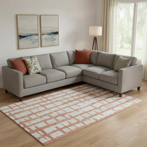 HomeRoots 8' x 10' Coral and Beige Striped Washable Area Rug with UV Protection for Busy Homes & Pets 669358