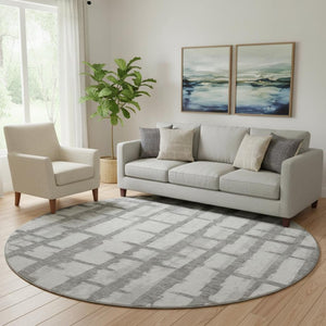 HomeRoots 8' Stylish Gray and Silver Striped Washable Round Rug with UV Protection for High-Traffic Homes 669363