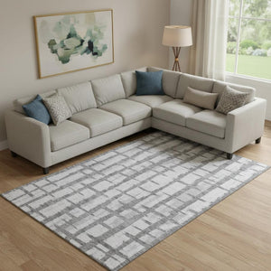 HomeRoots 9' X 12' Gray and Silver Striped Area Rug - Durable, Washable, UV Protected for High-Traffic Spaces 669365