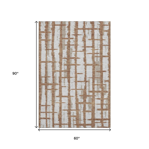 HomeRoots 5' X 8' Stylish Rust and Beige Striped Washable Area Rug with UV Protection for High-Traffic Homes 669386