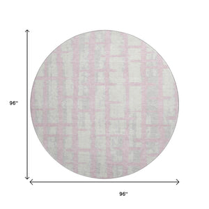 HomeRoots 8' Pink And Beige Striped Round Rug - Washable, UV Protected, Cozy, Durable for Living Spaces & Patios 669393
