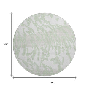 HomeRoots 8' Artichoke Green & Ivory Animal Print Washable Round Rug with UV Protection for Modern Spaces 669417