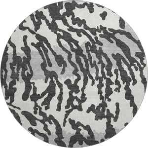 HomeRoots 8' Stylish Black and Ivory Animal Print Washable Round Rug with UV Protection for High Traffic Areas 669423
