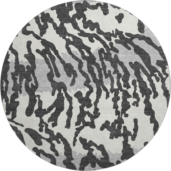 HomeRoots 8' Stylish Black and Ivory Animal Print Washable Round Rug with UV Protection for High Traffic Areas 669423