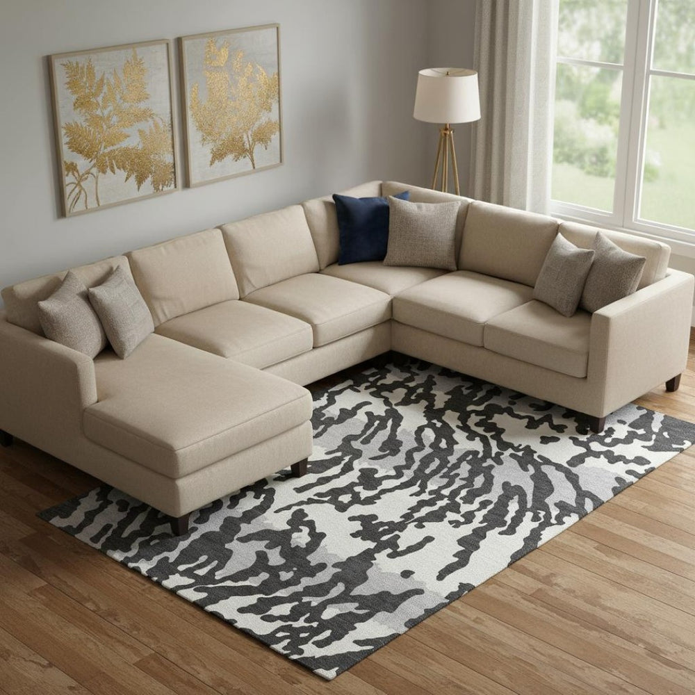 HomeRoots 9' X 12' Stylish Black & Ivory Animal Print Washable Area Rug with UV Protection for High-Traffic Homes 669425