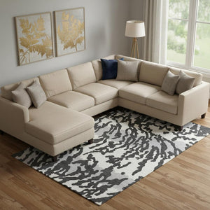 HomeRoots 9' X 12' Stylish Black & Ivory Animal Print Washable Area Rug with UV Protection for High-Traffic Homes 669425