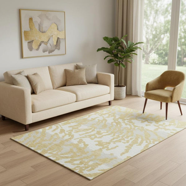 HomeRoots 5' X 8' Gold and Ivory Animal Print Area Rug - Washable, UV Protected, Stylish and Durable Design 669434