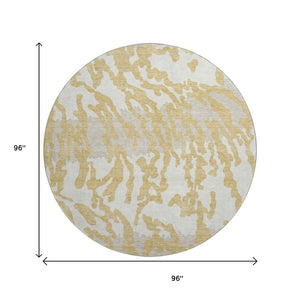 HomeRoots 8' Gold and Ivory Animal Print Round Rug - Washable, UV Protected, Stylish & Durable for Busy Homes 669435