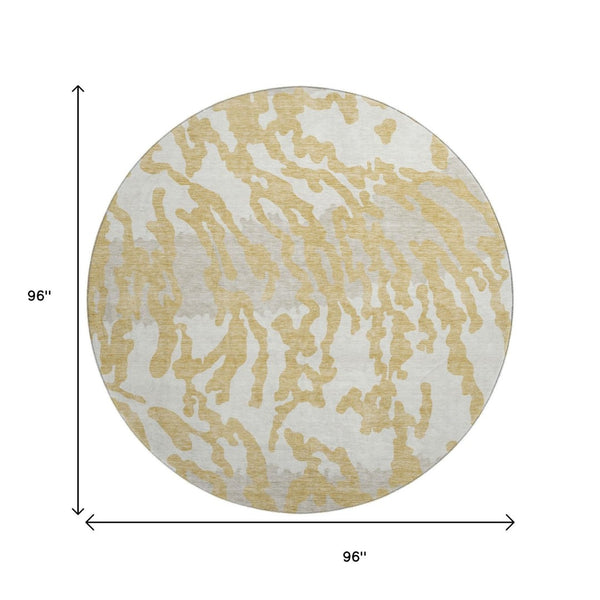 HomeRoots 8' Gold and Ivory Animal Print Round Rug - Washable, UV Protected, Stylish & Durable for Busy Homes 669435