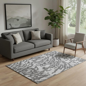 HomeRoots 5' X 8' Stylish Gray and Ivory Animal Print Area Rug – Washable, UV Protected, Non-Slip Design! 669440