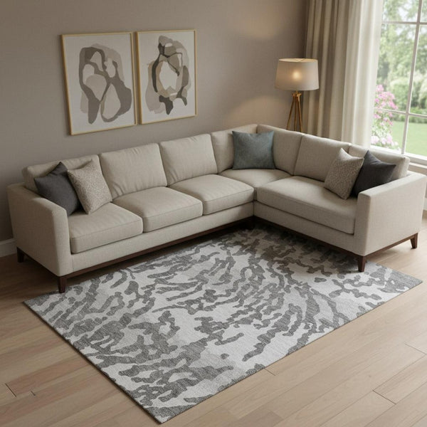 HomeRoots 9' X 12' Stylish Gray and Ivory Animal Print Washable Area Rug with UV Protection for High Traffic Spaces 669443