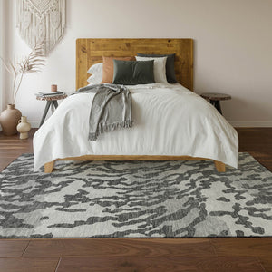 HomeRoots 9' X 12' Stylish Gray and Ivory Animal Print Washable Area Rug with UV Protection for High Traffic Spaces 669443