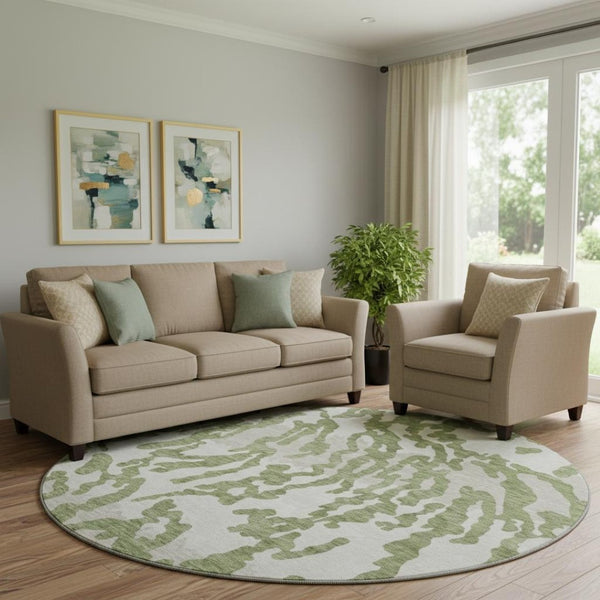 HomeRoots 8' Green and Ivory Animal Print Round Rug - Washable, UV Protected, Stain Resistant for Modern Homes 669447