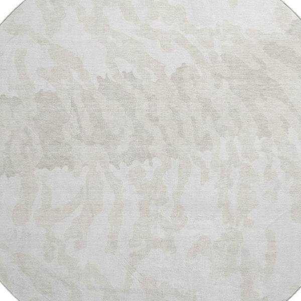 HomeRoots 8' Ivory and Beige Animal Print Round Rug - Washable, UV-Protected, Stylish & Durable for Any Space 669453