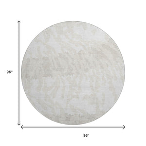 HomeRoots 8' Ivory and Beige Animal Print Round Rug - Washable, UV-Protected, Stylish & Durable for Any Space 669453