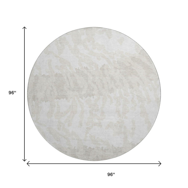 HomeRoots 8' Ivory and Beige Animal Print Round Rug - Washable, UV-Protected, Stylish & Durable for Any Space 669453
