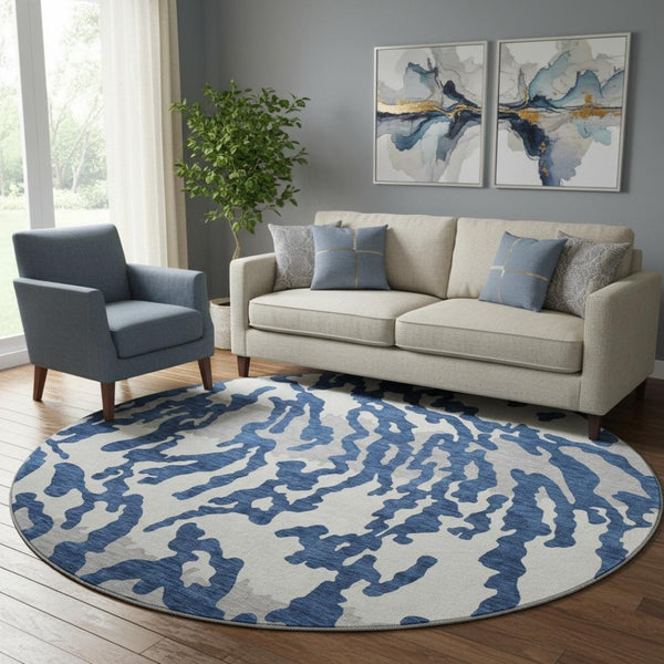 HomeRoots 8' Navy Blue & Ivory Animal Print Round Rug - Washable, UV Protected, Durable & Stain Resistant! 669459