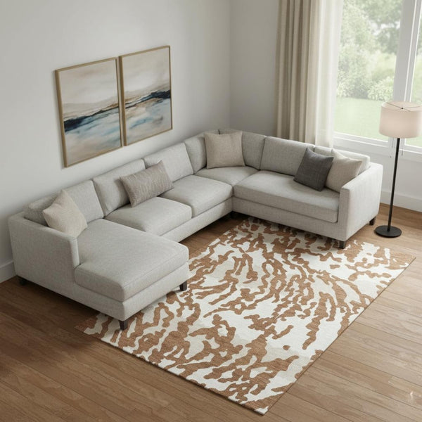 HomeRoots 9' X 12' Washable Rust and Ivory Animal Print Area Rug with UV Protection for High-Traffic Spaces 669467