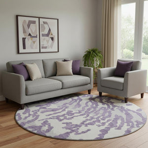 HomeRoots 8' Purple And Ivory Animal Print Round Area Rug - Washable, UV Protected, Perfect for High-Traffic Spaces 669471