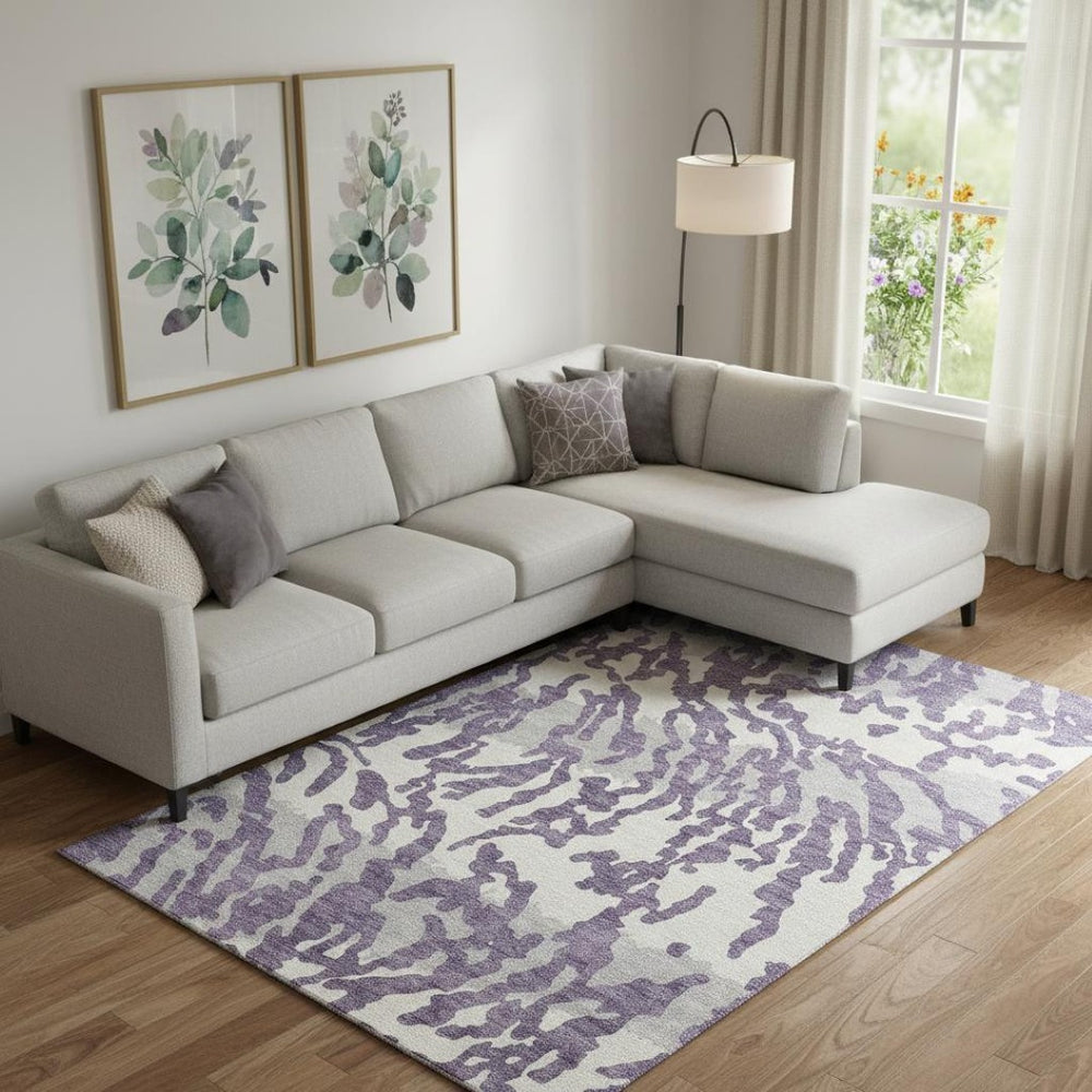 HomeRoots 9' X 12' Stylish Purple & Ivory Animal Print Washable Area Rug with UV Protection for Easy Care 669473