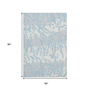 HomeRoots 5' X 8' Sky Blue & Ivory Animal Print Area Rug - Durable, Stain-Resistant, UV-Protected Design! 669476