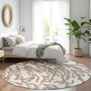 HomeRoots 8' Taupe and Ivory Animal Print Round Rug - Washable, UV Protected, Perfect for High-Traffic Areas 669483