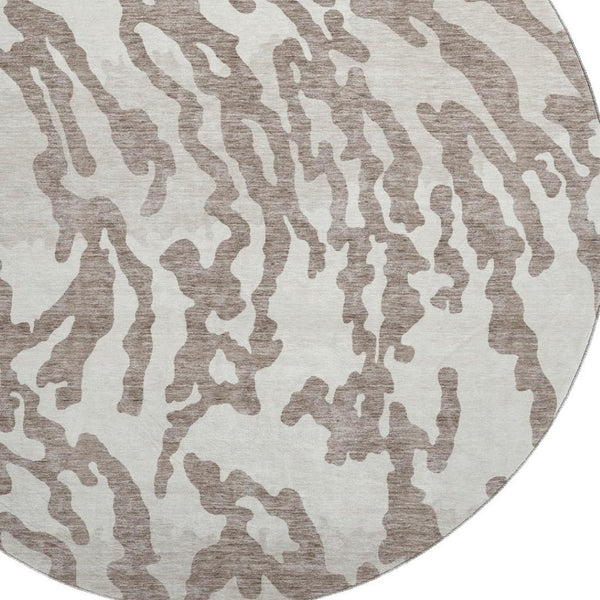 HomeRoots 8' Taupe and Ivory Animal Print Round Rug - Washable, UV Protected, Perfect for High-Traffic Areas 669483