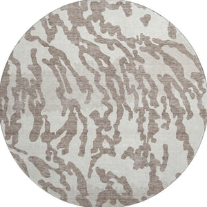 HomeRoots 8' Taupe and Ivory Animal Print Round Rug - Washable, UV Protected, Perfect for High-Traffic Areas 669483