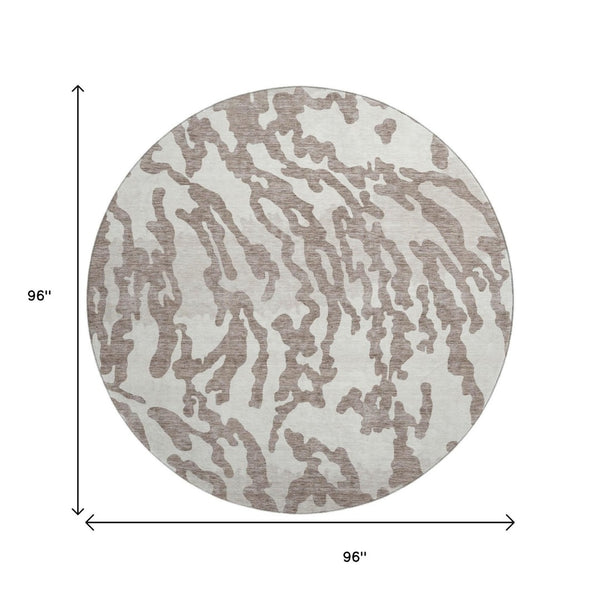 HomeRoots 8' Taupe and Ivory Animal Print Round Rug - Washable, UV Protected, Perfect for High-Traffic Areas 669483