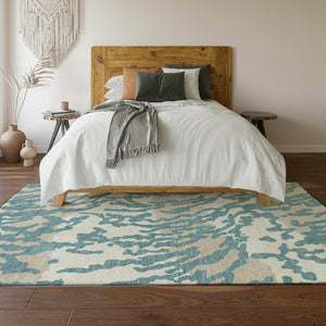 HomeRoots 5' Teal and Ivory Animal Print Area Rug – Washable, UV-Protected, Stain-Resistant for Any Room 669488