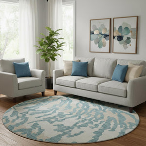 HomeRoots 8' Teal and Ivory Animal Print Round Rug - Washable, UV Protected, Durable Style for Any Space 669489
