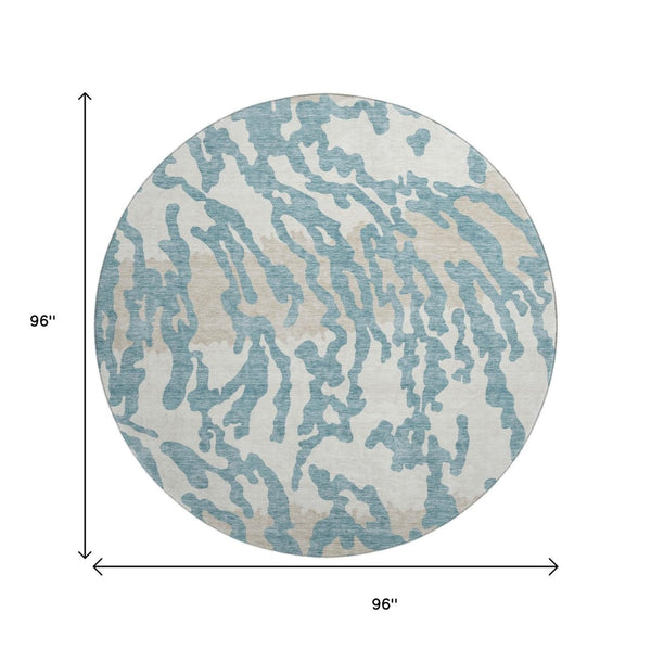 HomeRoots 8' Teal and Ivory Animal Print Round Rug - Washable, UV Protected, Durable Style for Any Space 669489