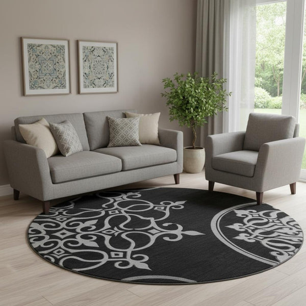 HomeRoots 8' Black And Ivory Floral Medallion Round Rug - Washable, UV-Protected, Durable & Stylish Home Accent 669501