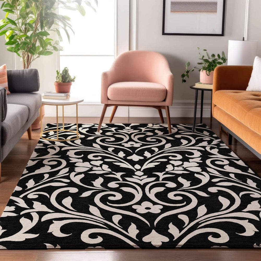 HomeRoots 5' X 8' Black And Ivory Floral Area Rug - Washable, UV Protected, Durable Style for Every Room 669584