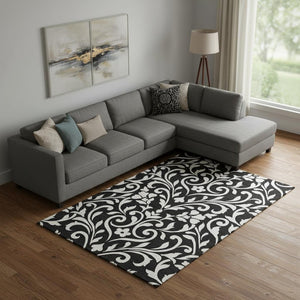 HomeRoots 9' X 12' Black And Ivory Floral Area Rug – Washable, Stain Resistant, UV Protected for Busy Homes 669587