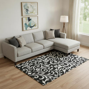 HomeRoots 10' X 14' Elegant Black and Ivory Floral Area Rug - Washable, UV Protected, Perfect for Busy Homes 669588