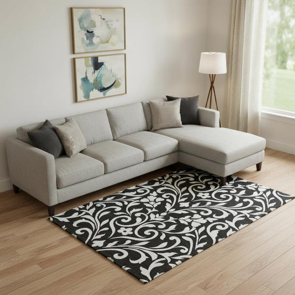 HomeRoots 10' X 14' Elegant Black and Ivory Floral Area Rug - Washable, UV Protected, Perfect for Busy Homes 669588