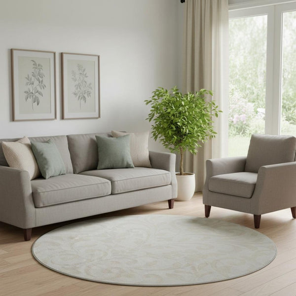 HomeRoots 8' Ivory and Beige Floral Round Rug - Washable, UV-Resistant, Perfect for High-Traffic Areas! 669615