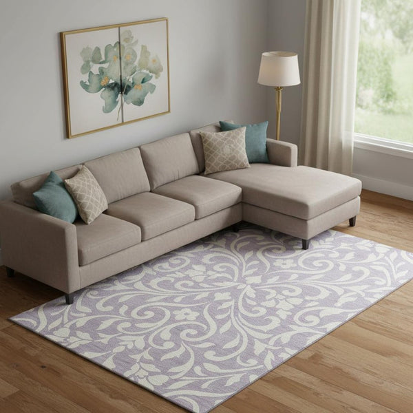 HomeRoots 9' X 12' Stylish Lavender Floral Area Rug – Washable, UV Protected, Stain Resistant for High-Traffic Homes 669623