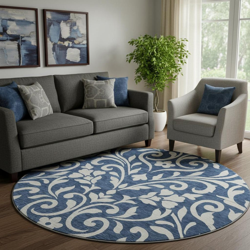HomeRoots 8' Navy Blue and Ivory Floral Washable Round Rug – Stain Resistant, UV Protected for High-Traffic Areas 669627