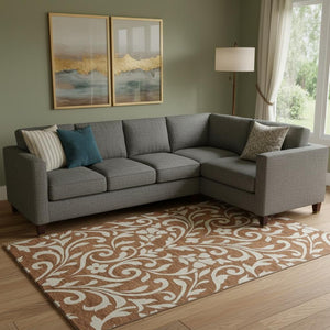 HomeRoots 9' X 12' Floral Area Rug in Rust & Beige – Washable, UV Protected, Stain Resistant, Durable Design 669635