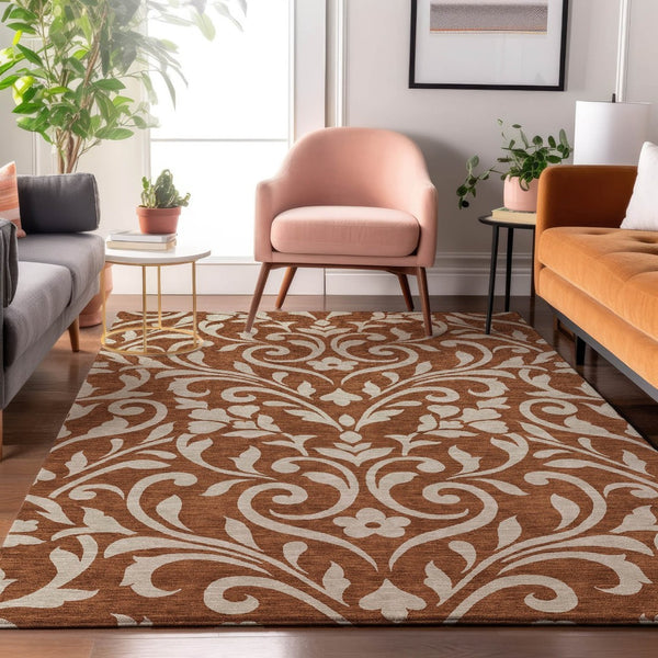 HomeRoots 9' X 12' Floral Area Rug in Rust & Beige – Washable, UV Protected, Stain Resistant, Durable Design 669635