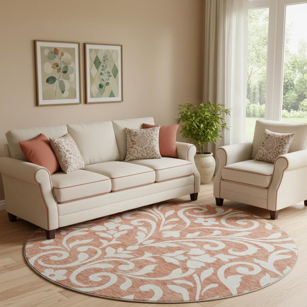 HomeRoots 8' Salmon and Ivory Floral Washable Round Rug - Durable, UV Protected, Perfect for Family Spaces! 669645