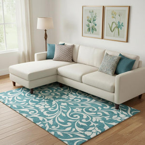 HomeRoots 9' X 12' Teal Floral Washable Area Rug - Durable, UV-Protected, Perfect for Homes with Kids & Pets 669665
