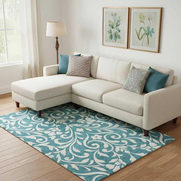 HomeRoots 9' X 12' Teal Floral Washable Area Rug - Durable, UV-Protected, Perfect for Homes with Kids & Pets 669665