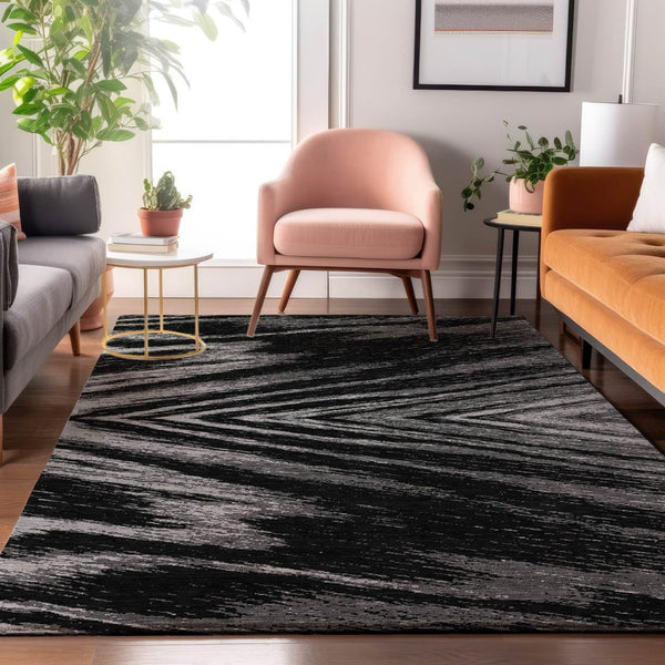 HomeRoots 10' X 14' Modern Black & Gray Abstract Washable Area Rug with UV Protection for High-Traffic Spaces 669678