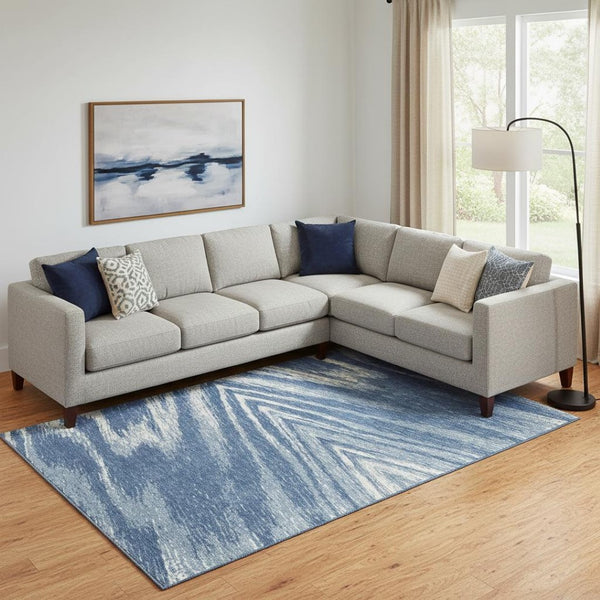 HomeRoots 8' X 10' Blue and Ivory Abstract Area Rug - Stylish, Washable, UV Protected, Ideal for High-Traffic Spaces 669682